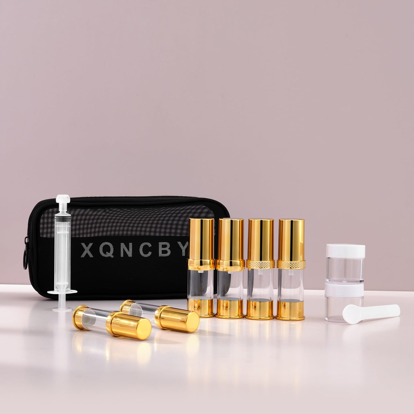 XQNCBY golden airless pump bottle with travel bag set with labels empty refillable cosmetic pump travel size containers hair oil, lotion and other liquids 5ml 10ml 15g(12 Packs)