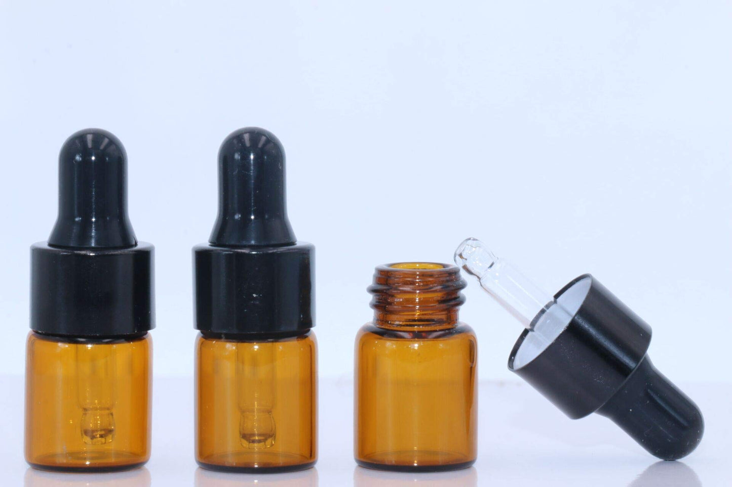 30Pcs Amber Glass Dropper Bottles Mini Empty Sample Vials Essential Oil Dropping Bottles Perfume Jars Cosmetic Container with Glass Eye Dropper and Black Caps (2ml)