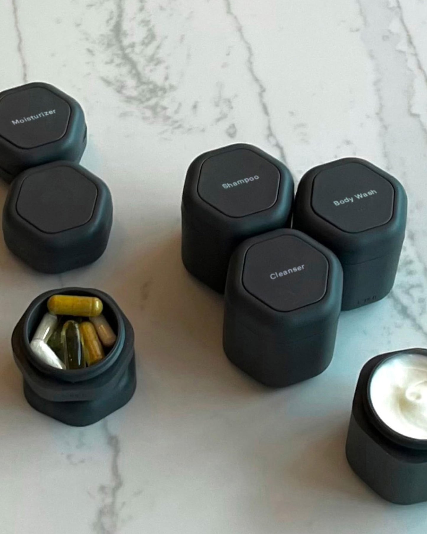 Cadence Travel Containers - Daily Routine Capsule Set - Magnetic Travel Capsules - For Shampoo, Conditioner, Body Wash, Pills, and More - 4 Flex Mediums (1.32oz) & 3 Flex Smalls (0.56oz) - Pacific