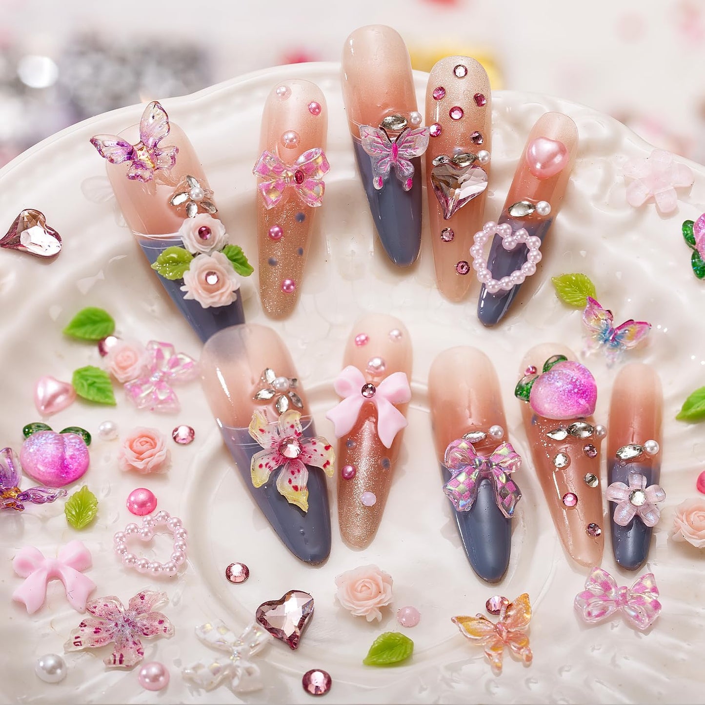 28 Grids Nail Charms Kit with Rhinestones for Nails, 3D Kawaii Bows, Cherry, Flowers, Butterfly. Red Pink Gold Nail Gems, Pearls & Metal Studs. DIY Manicure Art Supplies with Wax Pen & Tweezers