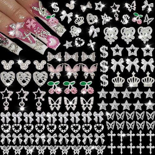 KACHIMOO 106 Pcs Nail Charms and Gems Silver Nail Charms Nail Rhinestones for Nails Design 3D Butterfly, Bow, Star,Cherry,Cross,Dollar,Heart Shapes for Acrylic Nails (19 Styles)