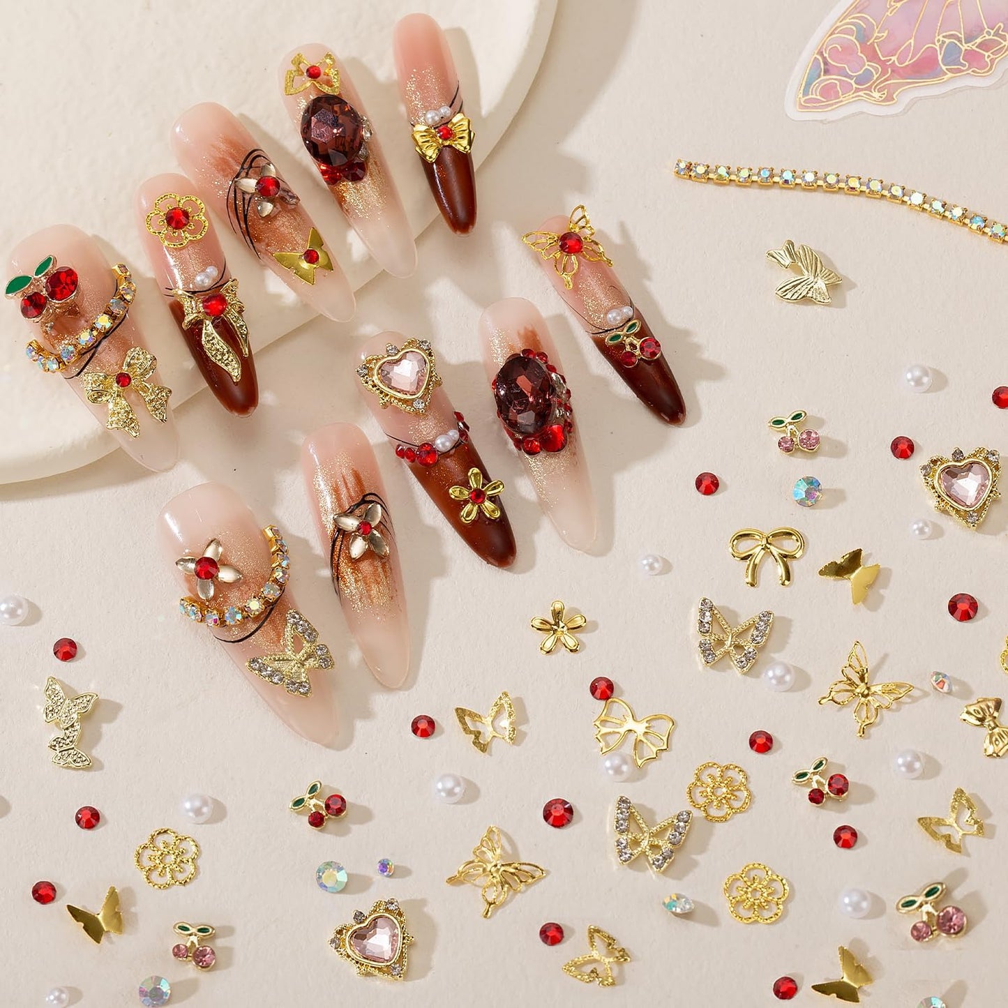 28 Grids Nail Charms Kit with Rhinestones for Nails, 3D Kawaii Bows, Cherry, Flowers, Butterfly. Red Pink Gold Nail Gems, Pearls & Metal Studs. DIY Manicure Art Supplies with Wax Pen & Tweezers