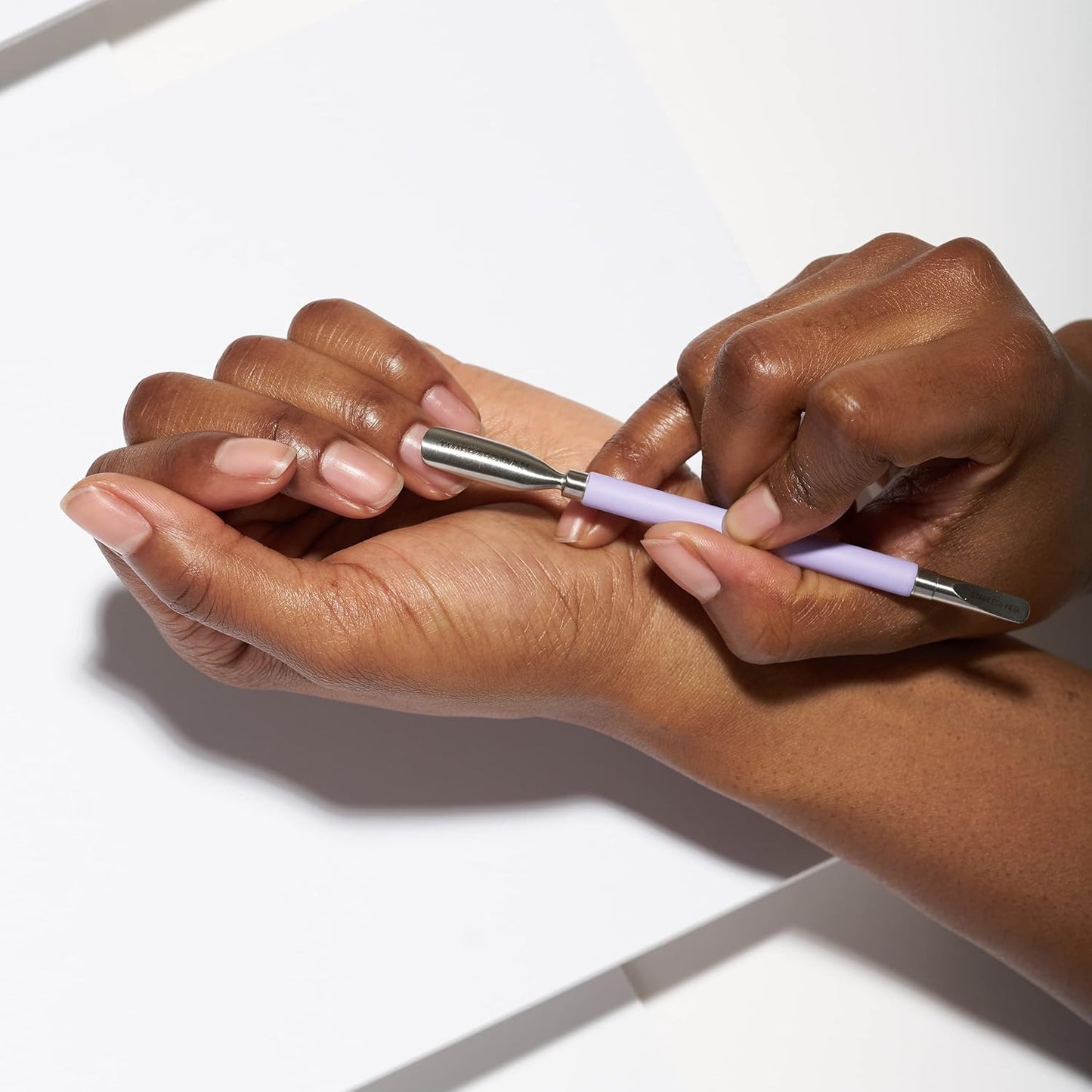 Tweezerman Dual-Sided Pushy - Professional Nail Care Tool in Vibrant Purple Color