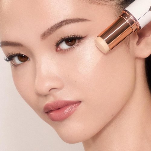 Charlotte Tilbury Unreal Skin Tint - Hydrating Cream Foundation Stick with Sheer-to-Light Coverage & Buildable Formula