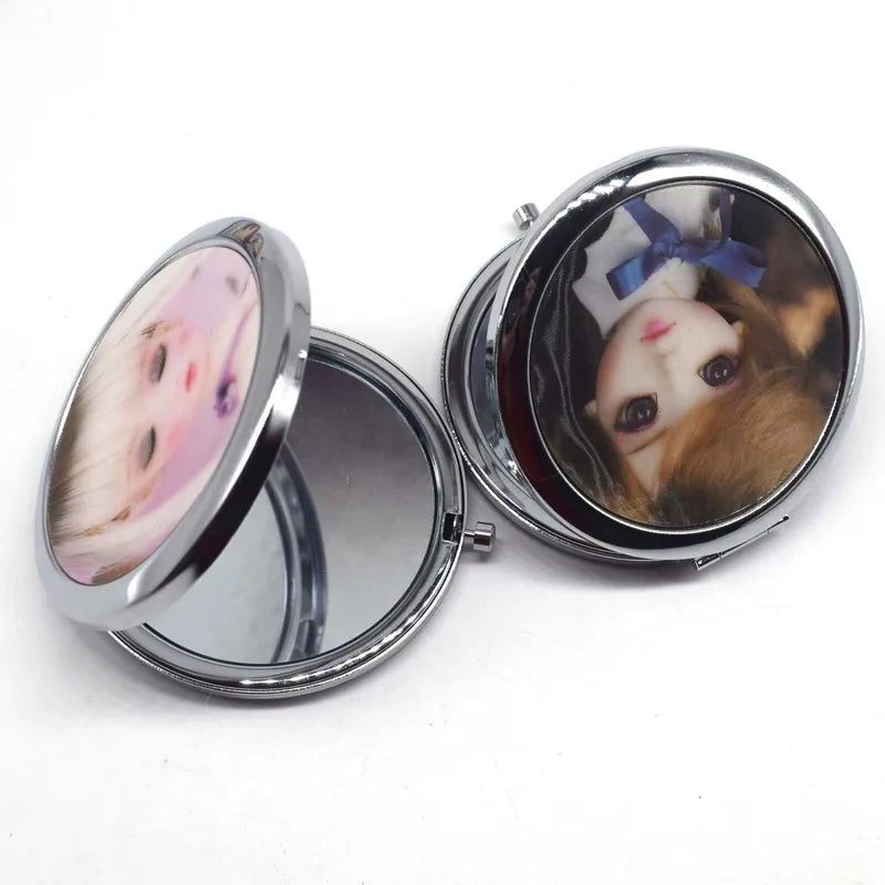 Mini Double-Sided Pocket Makeup Mirror - Cute Doll Design, Stainless Steel, Portable