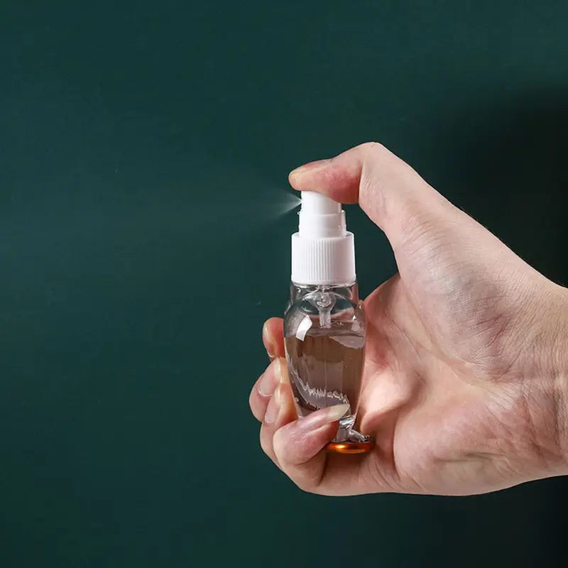 50ml Refillable Heart & Leaf Spray Bottle - Travel Perfume Lotion Container with Metal Hook