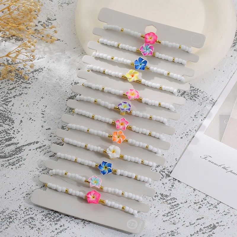 Colorful Clay Frangipani Charm Bracelet Set for Women - Adjustable Rope Jewelry Gift 12 pcs