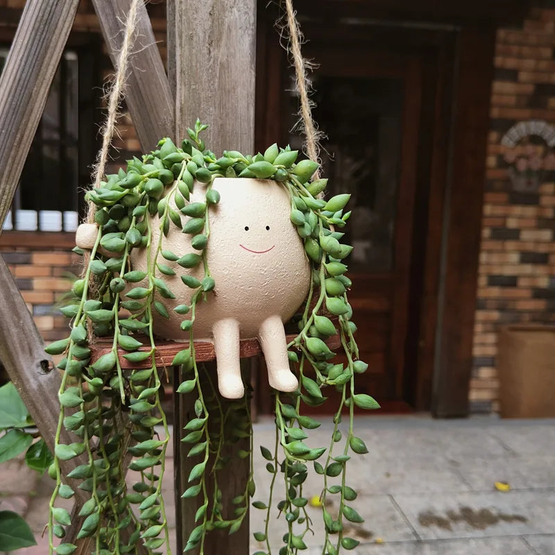 Resin Hanging Planter Pot with Smiling Face Design and Swing Base - Indoor Outdoor Garden Decor