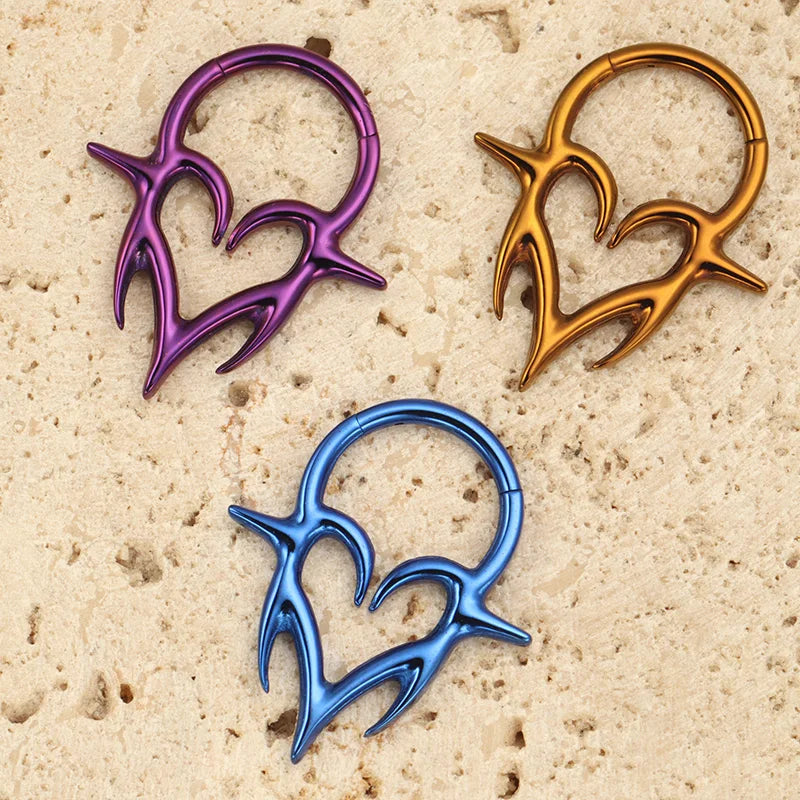 Titanium Septum Piercing Clicker with Tribal Fangs and Heart Totem Design