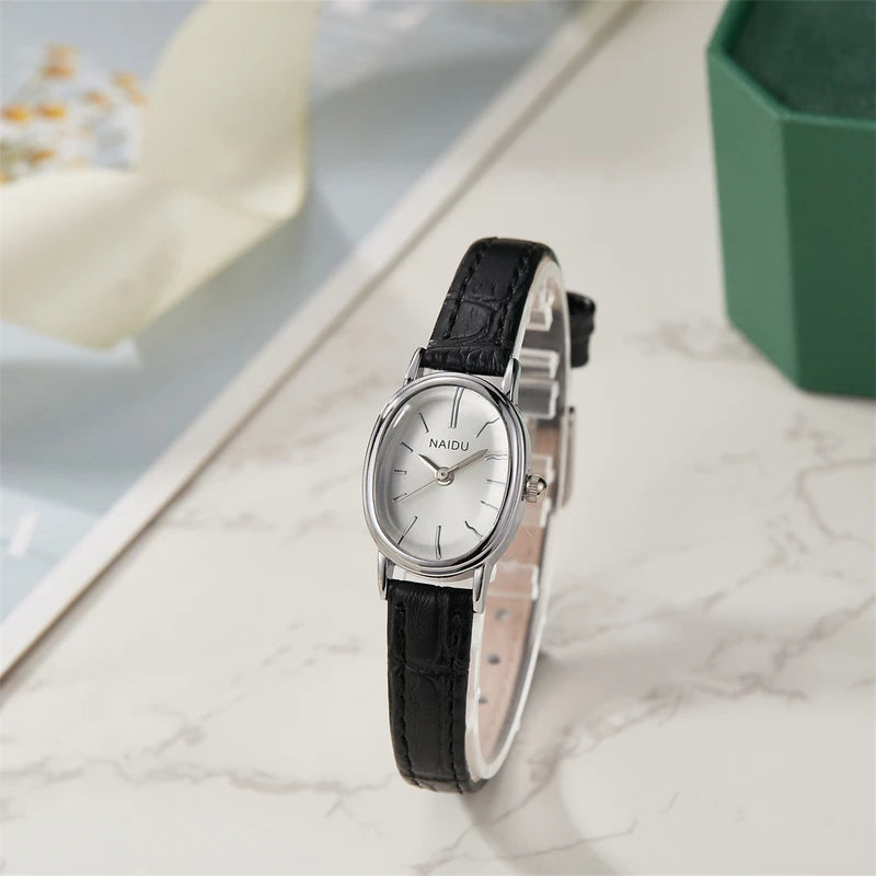 Elegant Ladies Quartz Watch with Smooth Dial and Oval Case - Multiple Colors