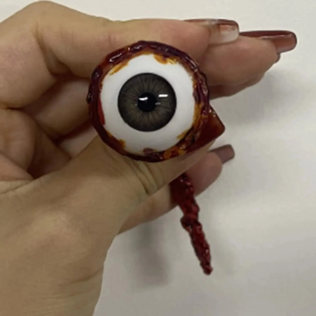 Realistic Bloody Ripped Out Eyeball Prop for Halloween Parties - Fake Horror Decorations