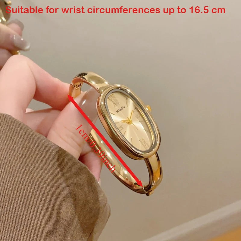 Women’s Oval Roman Dial Quartz Watch with Gold Finish and Bracelet Strap