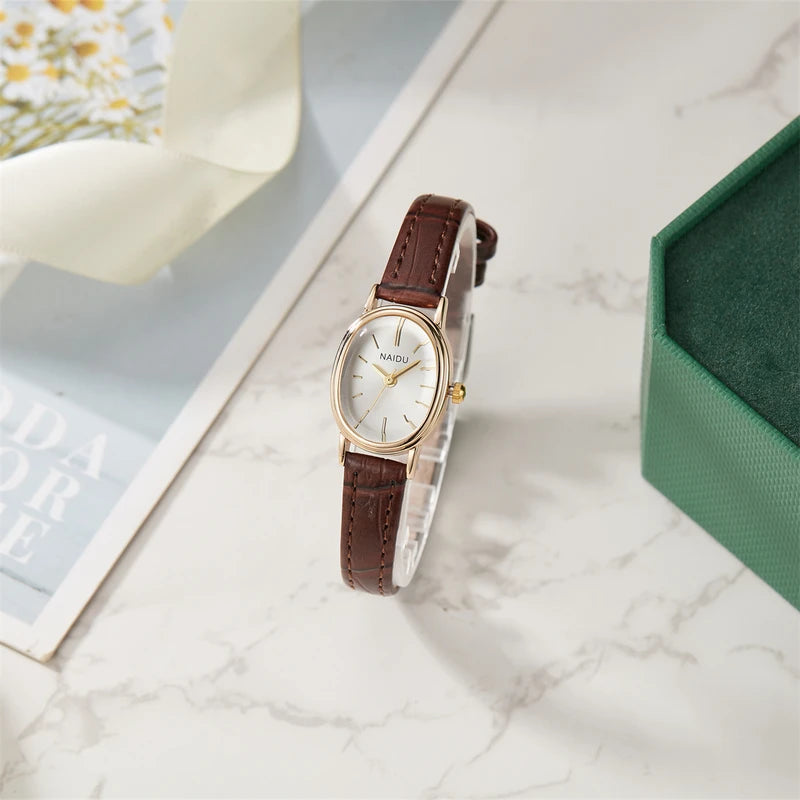 Elegant Ladies Quartz Watch with Smooth Dial and Oval Case - Multiple Colors