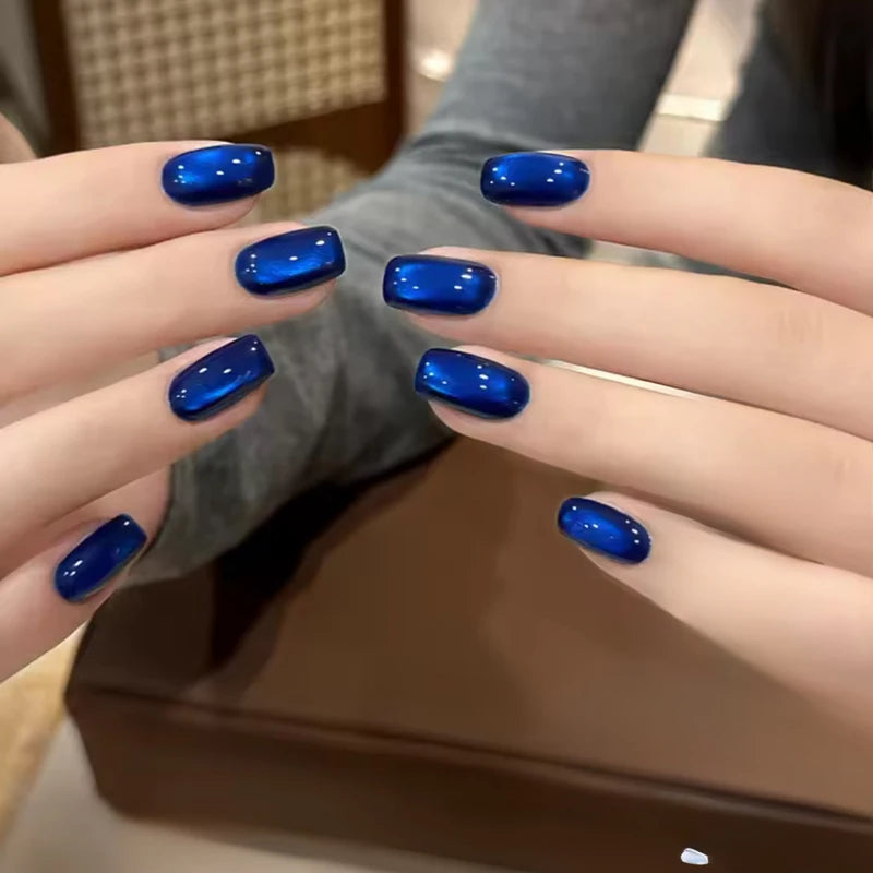 Vibrant Blue Moon Cat Eye Nail Gel with Sparkling Glass Bead Effect - Trendy Nail Art