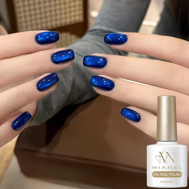 Vibrant Blue Moon Cat Eye Nail Gel with Sparkling Glass Bead Effect - Trendy Nail Art