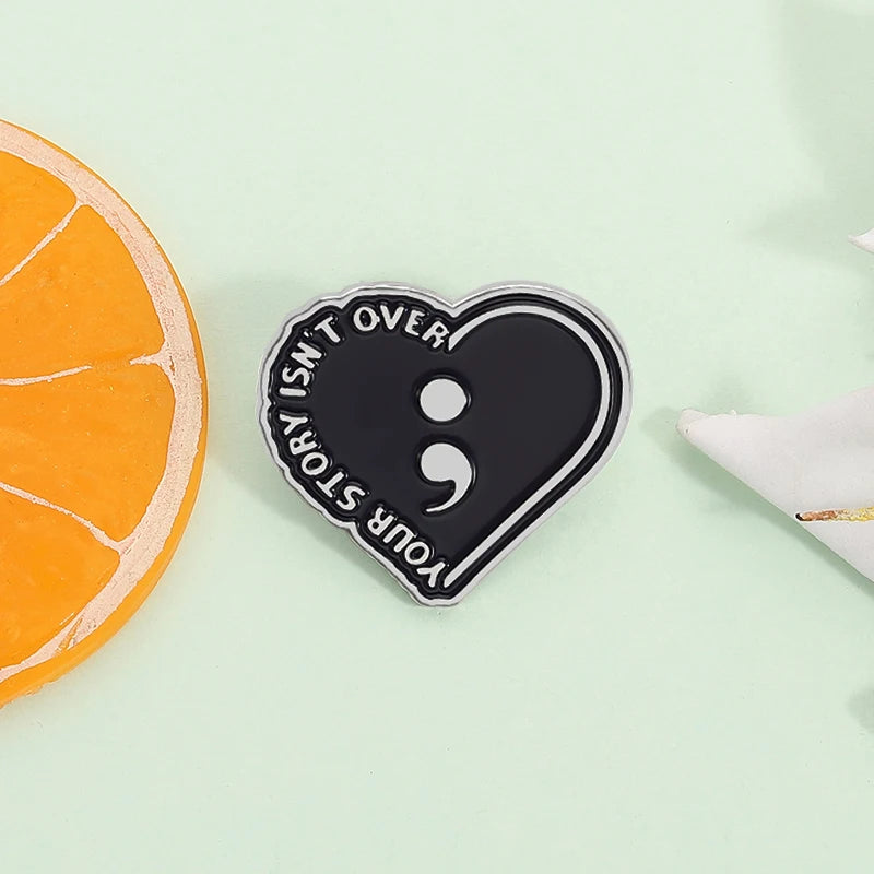 Semicolon Motivational Enamel Pin - Your Story Isn't Over Black Heart Badge
