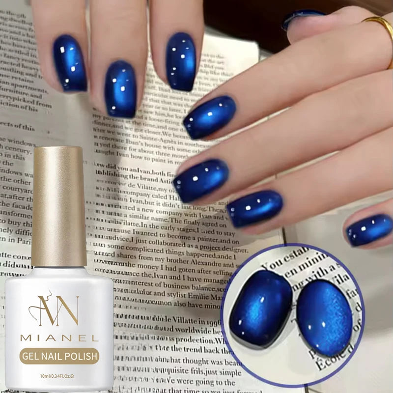 Vibrant Blue Moon Cat Eye Nail Gel with Sparkling Glass Bead Effect - Trendy Nail Art
