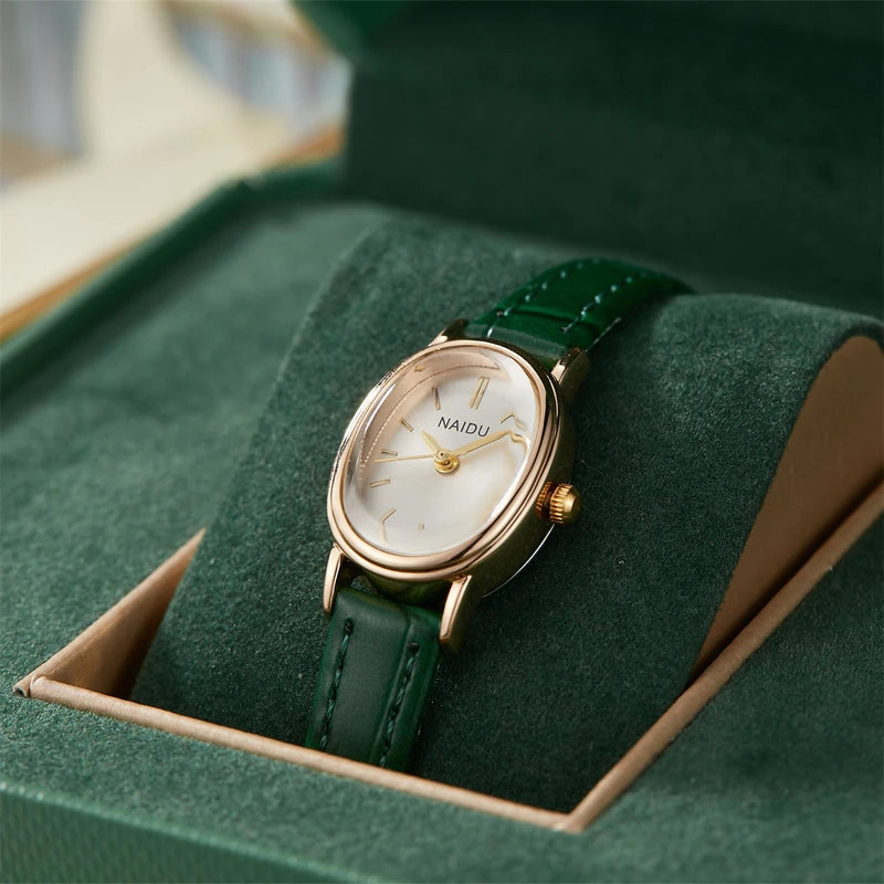 Elegant Ladies Quartz Watch with Smooth Dial and Oval Case - Multiple Colors