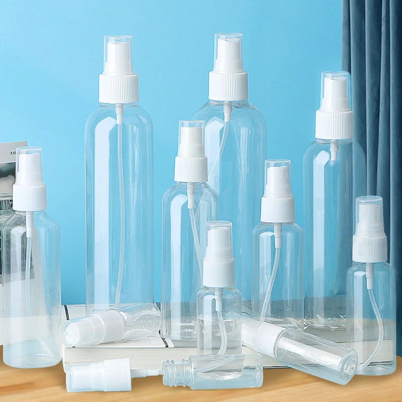 Refillable Travel Spray Bottles Set with Mist Pump - Portable Transparent Vials