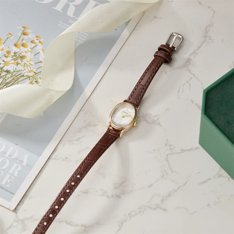 Elegant Ladies Quartz Watch with Smooth Dial and Oval Case - Multiple Colors