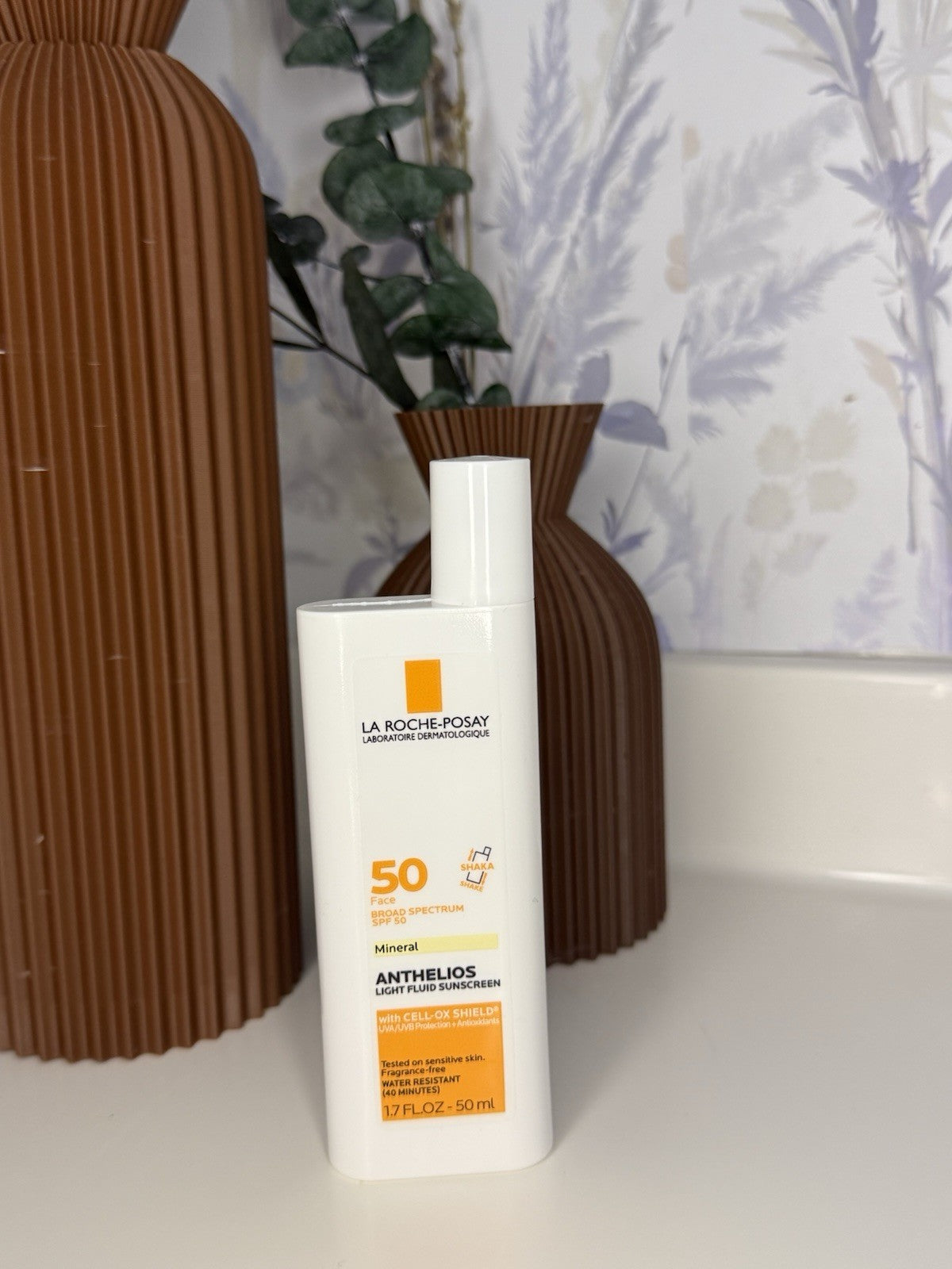 SPF 50 Tinted Sunscreen Fluid - Ultra-Light, Broad Spectrum UV Protection