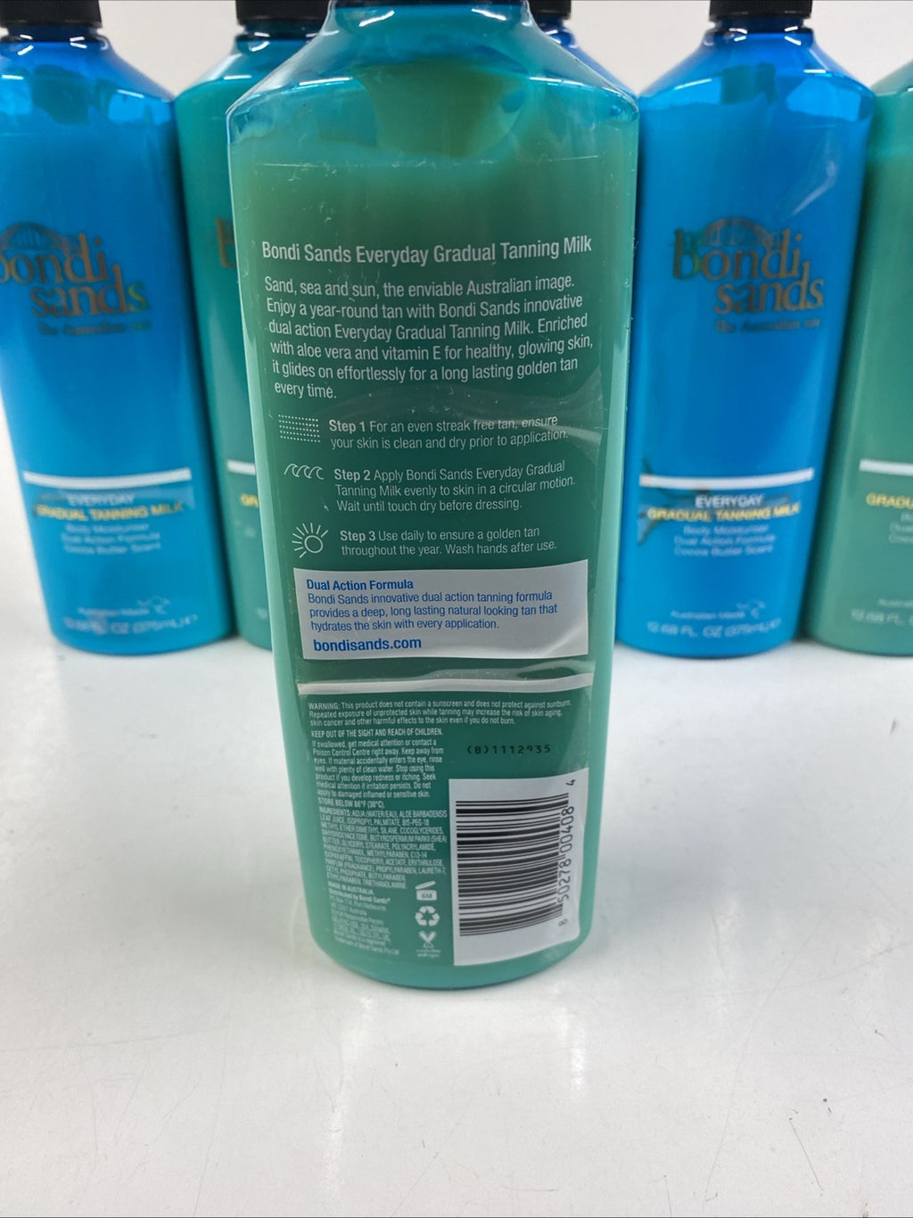 6-Pack Body Moisturizer with Gradual Tanning Milk - 12.68 Fl Oz Each