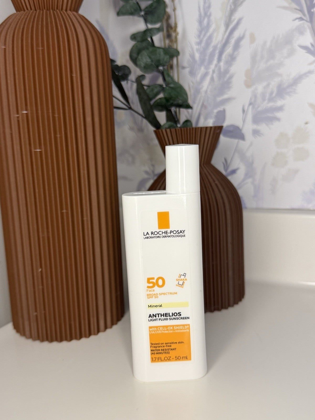 SPF 50 Tinted Sunscreen Fluid - Ultra-Light, Broad Spectrum UV Protection