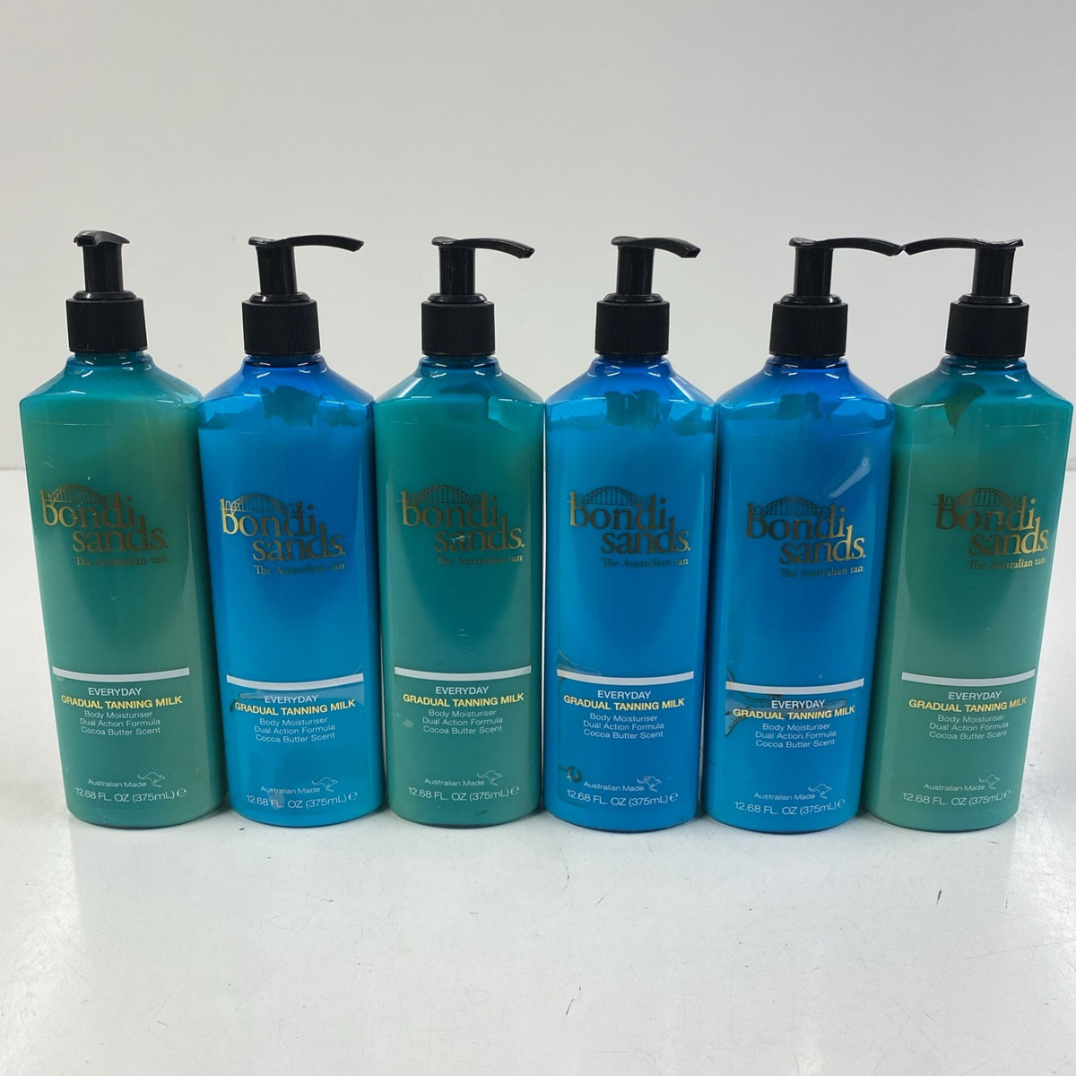 6-Pack Body Moisturizer with Gradual Tanning Milk - 12.68 Fl Oz Each